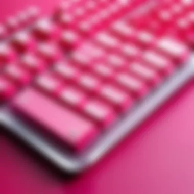 User typing on the Ducky pink keyboard in a gaming setup