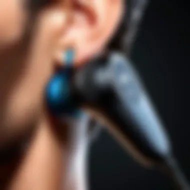 Close-up of a Bluetooth microphone earpiece showcasing its sleek design and features.