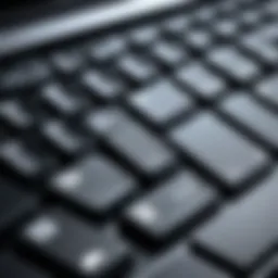 Close-up of a laptop keyboard highlighting functional keys